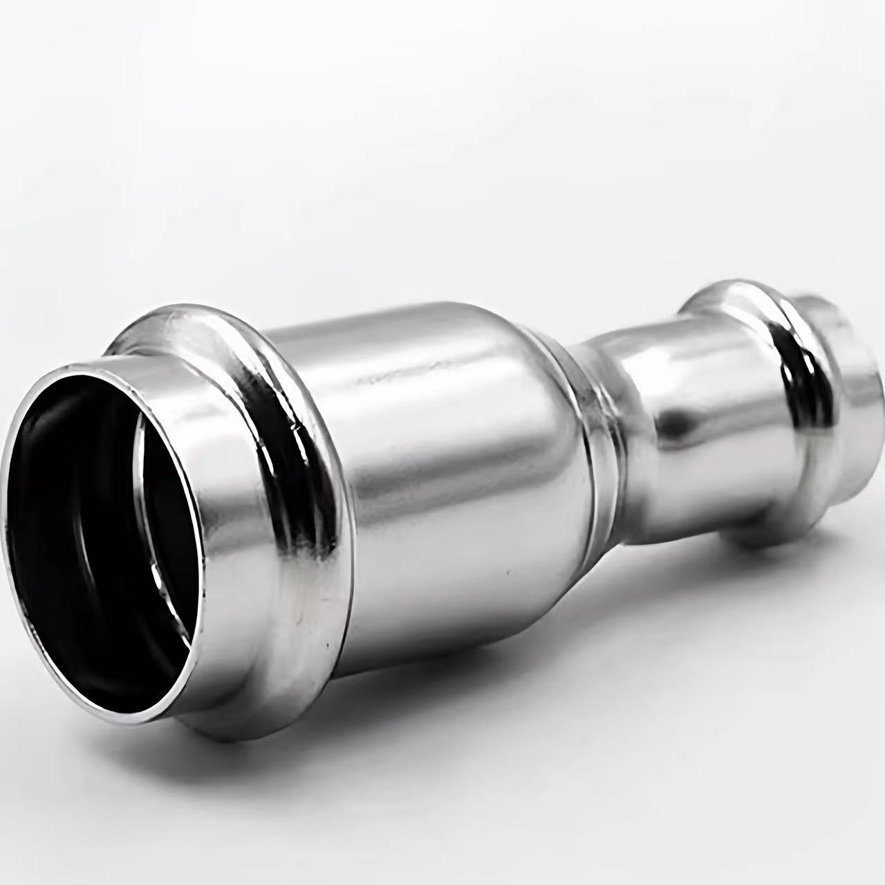 Dobbelttryk reducerende fitting